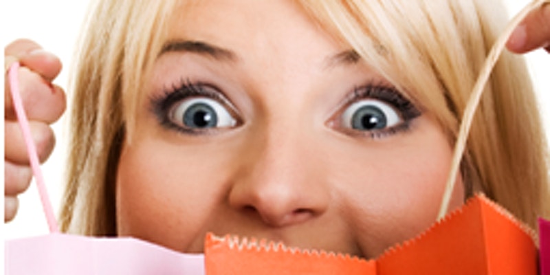 woman happy about the shopping bags she is holding