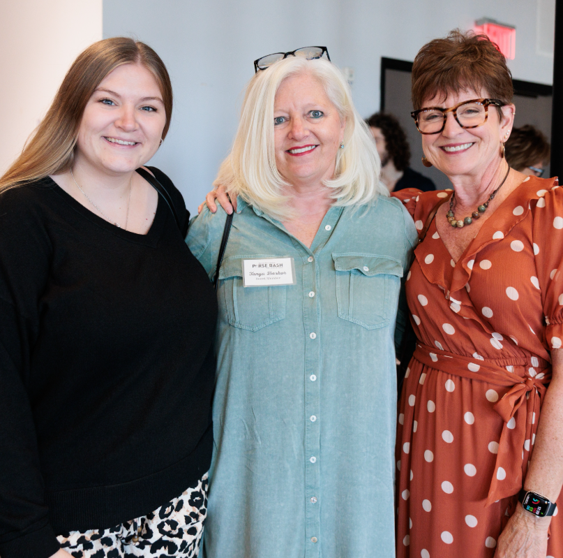 Volunteers and clients at Treasure House Fashions