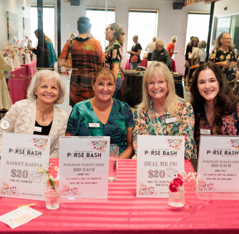 Volunteers and clients at Treasure House Fashions